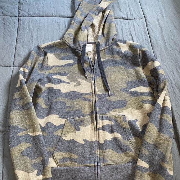 Victoria’s Secret zip-up jacket.